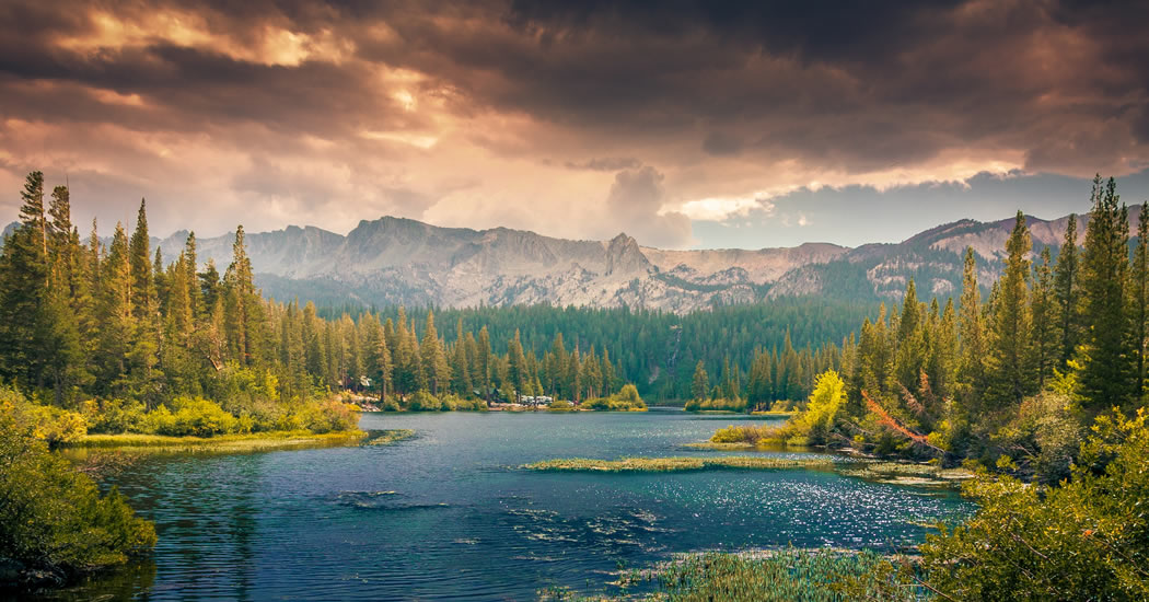 landscape of lake, mountains and clouds